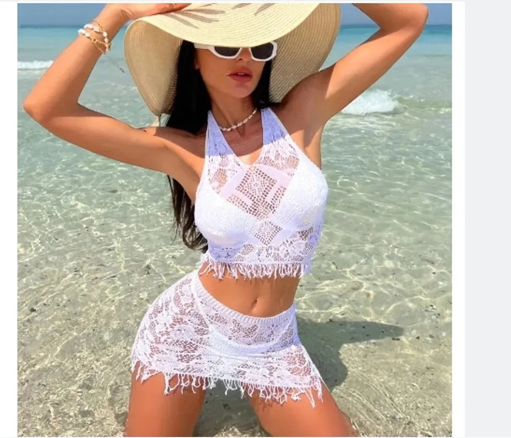 Women's black and white two-piece bikini swimsuit set with lace cover-up skirt