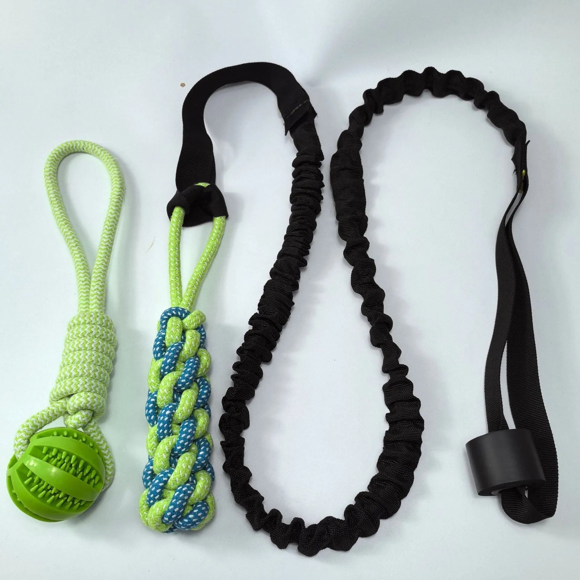 Cotton thread dog tug rope toy in green corncob design for bite and pull play.