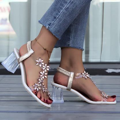 Women's fashion sandals with transparent square heels and decorative flowers, square toe design in black plum colour