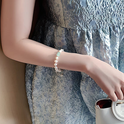 Pink irregular freshwater pearl bracelet on alloy chain, adjustable 16-22cm with 8-12mm beads