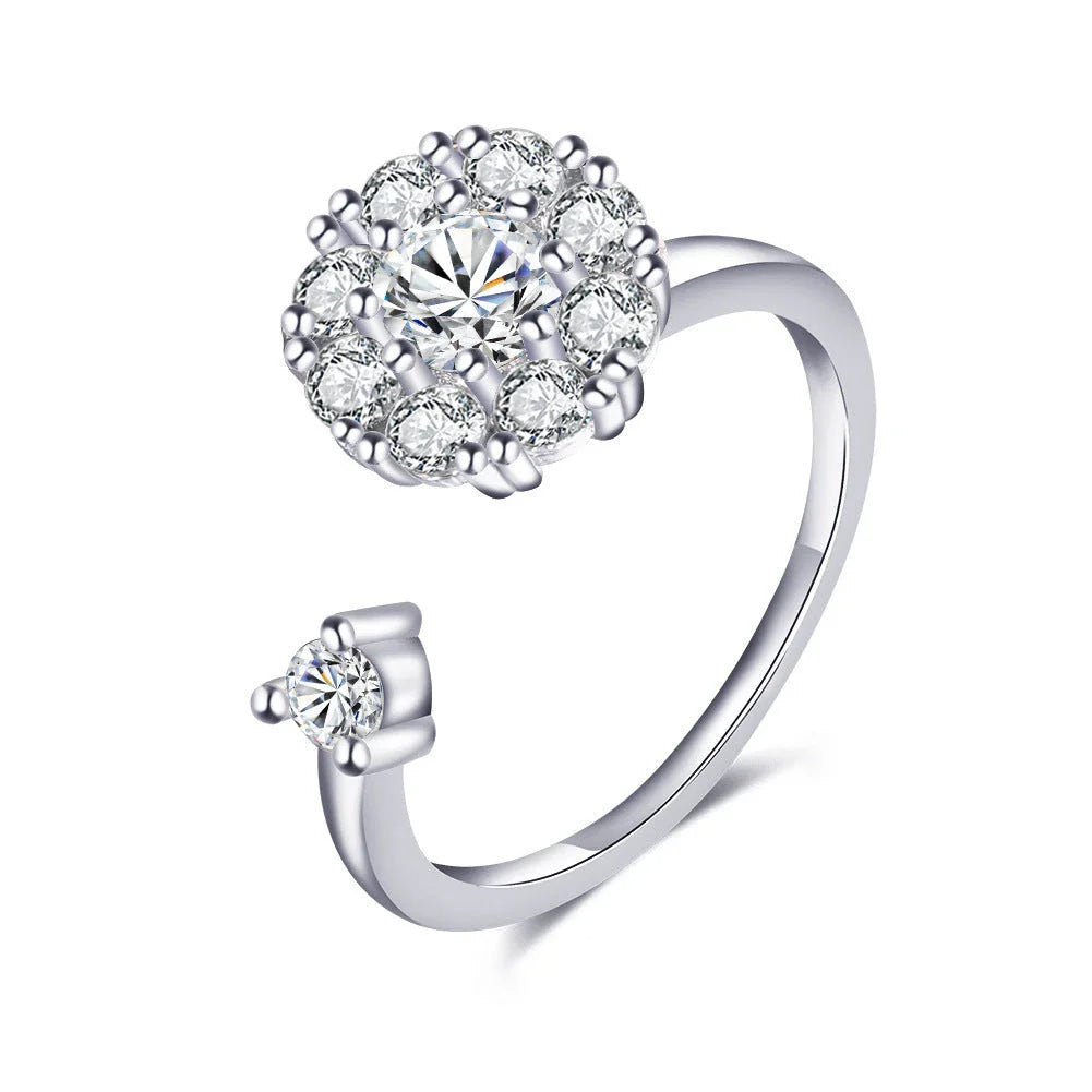 Adjustable rotating spinner ring with elegant flower and bee design in various color options