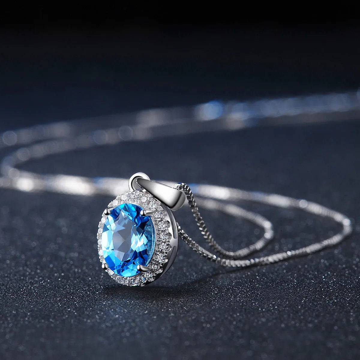 925 sterling silver geometric blue topaz jewellery set including earrings, ring, pendant and necklace