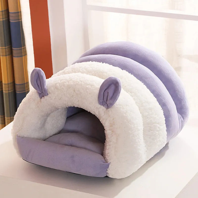 Closed round cat nest bed in blue, pink, or purple with soft plush interior and anti-skid bottom.