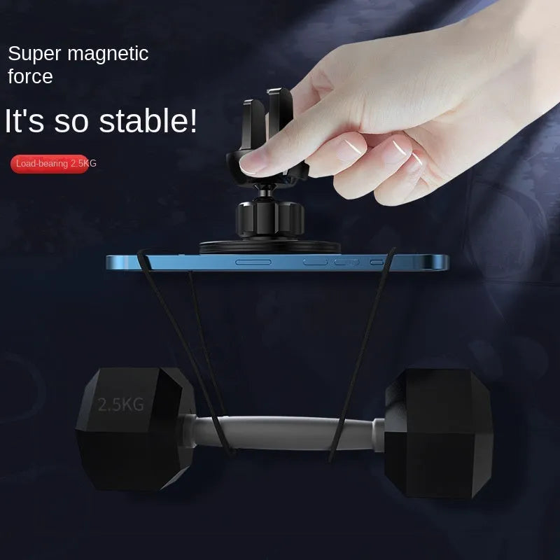Black aluminium alloy magnetic car air vent phone holder attached to vehicle dashboard vent.