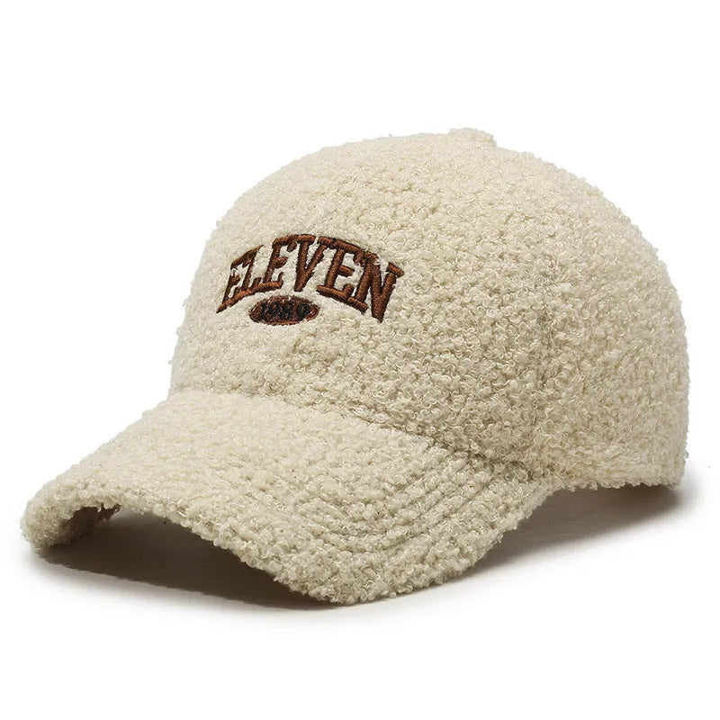 Adjustable lambskin-look winter baseball cap in dome crown style shown in multiple colours.