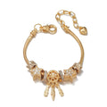 Unisex alloy bracelet with dreamcatcher pendant and star bead, KC gold finish, lobster clasp