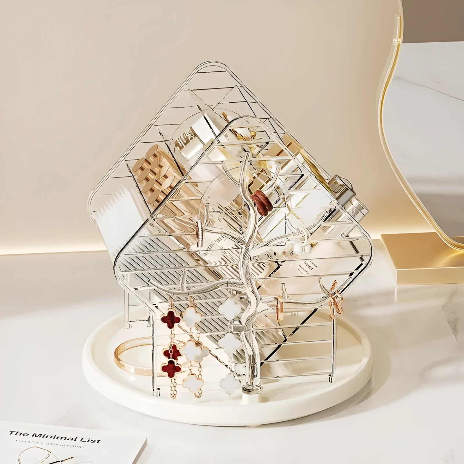 Clear and amber gold rotating plastic cosmetics storage box organiser on a vanity.
