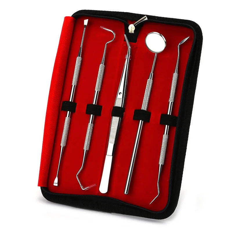 Stainless steel dental tools set with oral mirror and probes on grey background