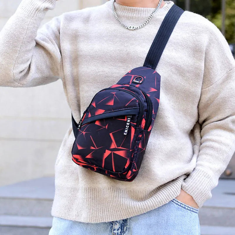 A blue print sling chest bag for men with an earphone hole, shown in a square vertical crossbody style.