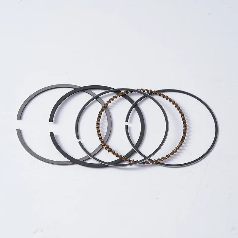 Motorcycle engine piston kit showing aluminium piston, steel oil ring, and pin for 57.4mm cylinder