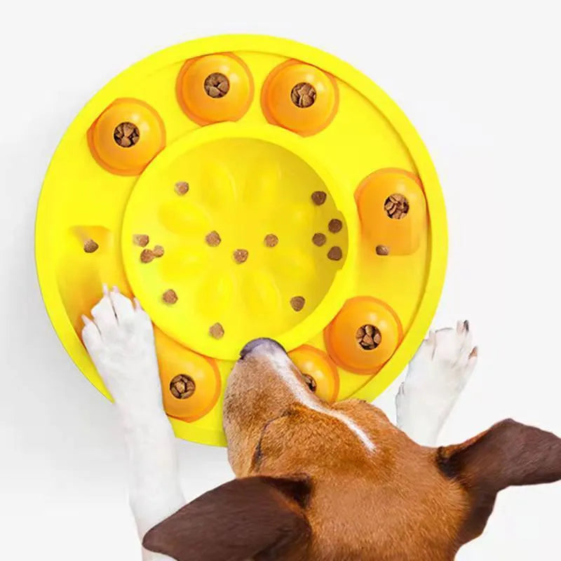 Square green dog puzzle feeder bowl with rotating turntable top and non-slip rubber base.