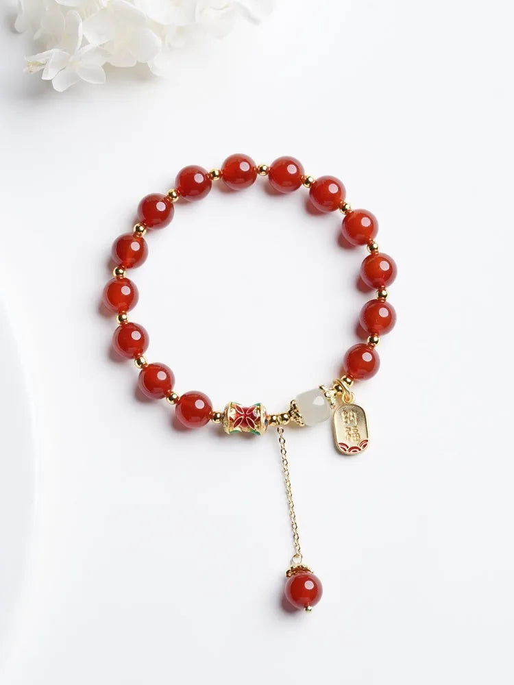 Women's red agate and Hetian jade bracelet with gold plating showing single circle, double circle, and happy ankang styles.