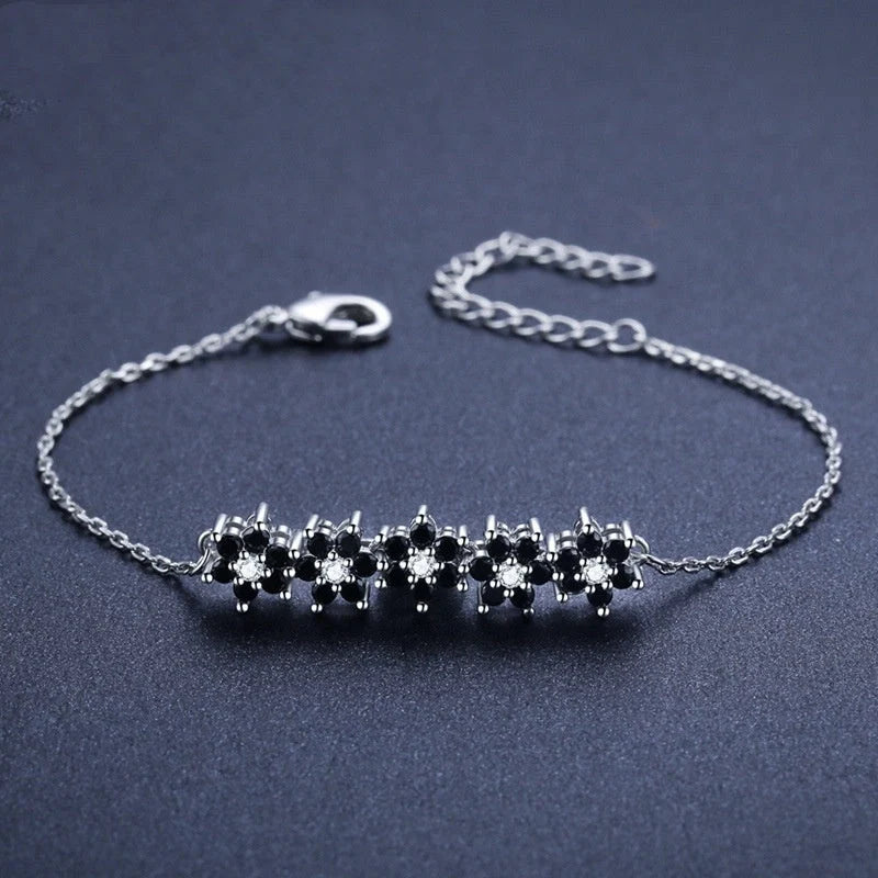 High Profile Fashion Lady's Flower Bracelet in black titanium steel with intricate flower design