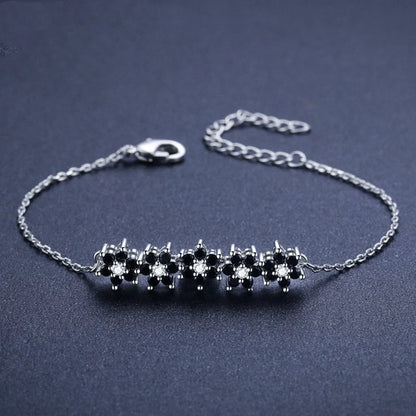High Profile Fashion Lady's Flower Bracelet in black titanium steel with intricate flower design