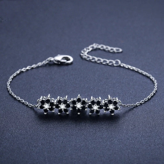 High Profile Fashion Lady's Flower Bracelet in black titanium steel with intricate flower design