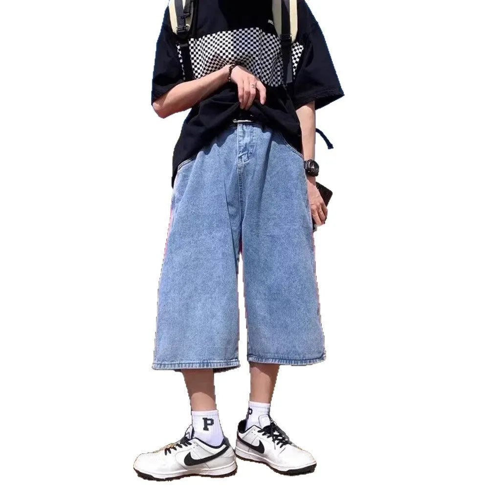 Blue high-waisted men's denim pirate shorts with a cropped length and straight-leg silhouette on a white background.