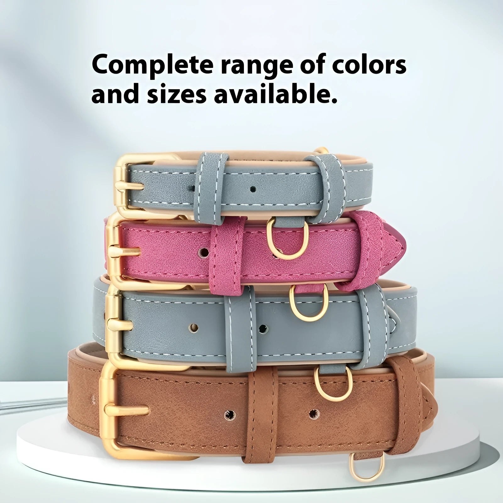 A brown double-layer leather dog collar with a matching lead, shown with size tags S, M, L, XL.