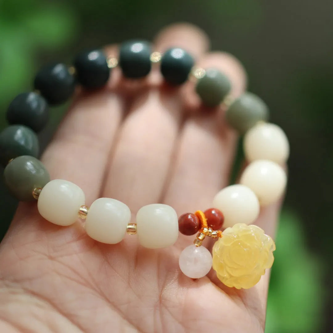 Natural bodhi root bracelet with 10mm beads in gradient white jade colour and lotus pendant