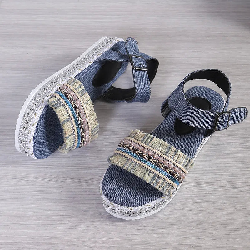 Women's tassel denim sandals with thick flat sole and buckle closure in blue