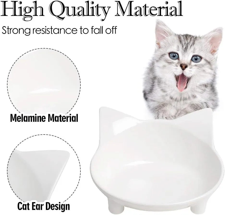 Black shallow cat food bowl with non-slip rubber base on kitchen floor