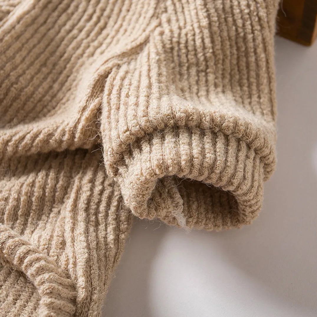 Brown knitted dog sweater jumper on a small dog, showing casual pullover design.