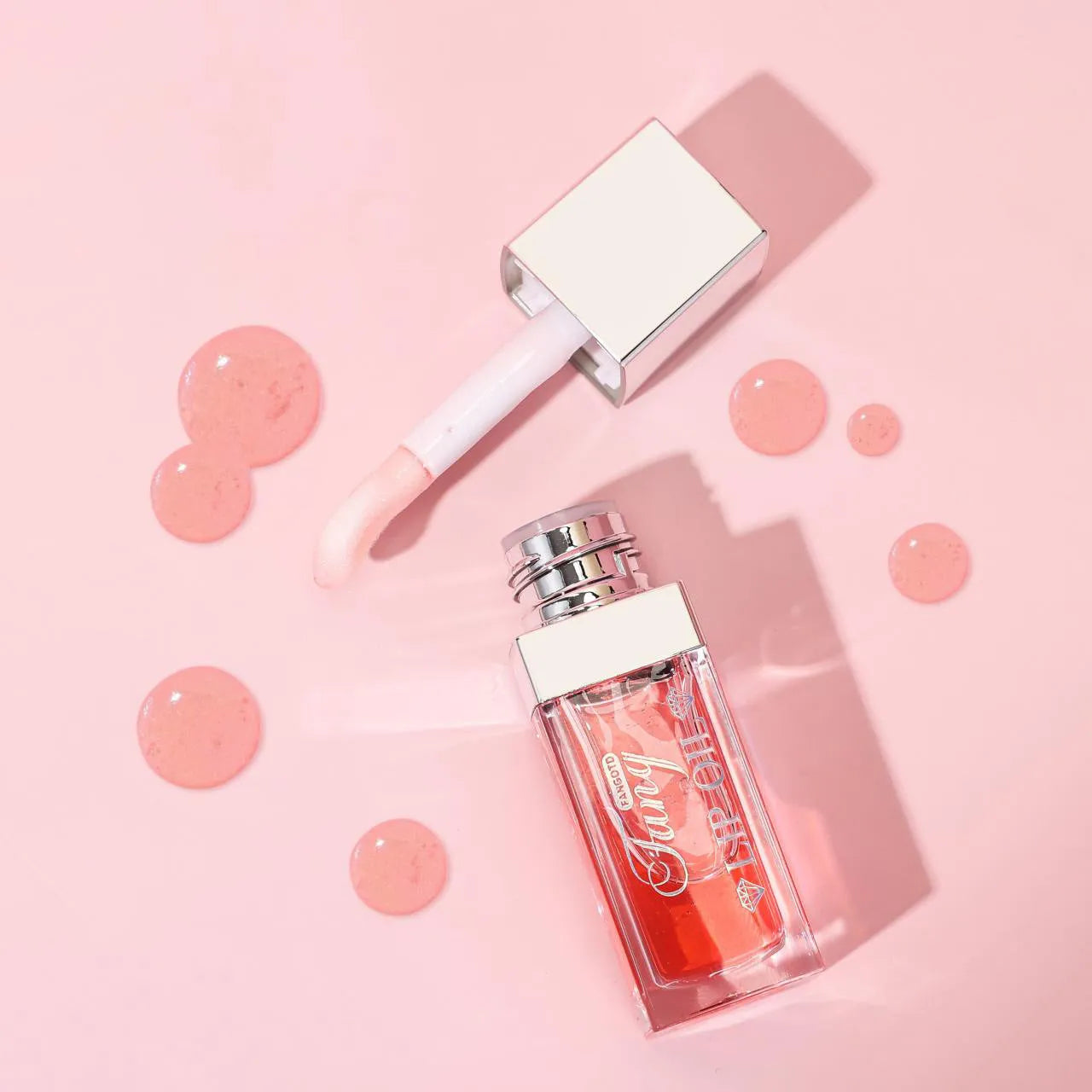 Five bright coloured mint lip gloss tubes showing shades Style001, Style006, Style007, Style012 and Style015