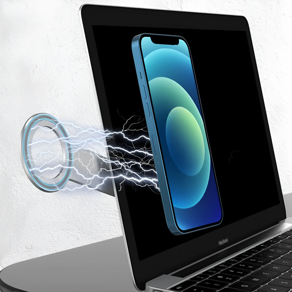 Silver aluminium alloy magnetic extension holder for mobile phones on a desktop.