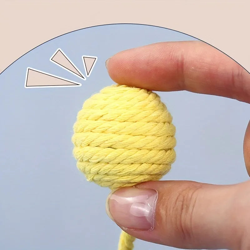 Coloured cat toy ball with rope handle and internal bell in 6cm or 3cm sizes