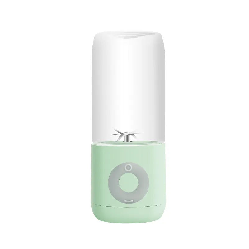 Mini USB automatic juicer in pink white and green colours with compact design 7x7x19.5cm