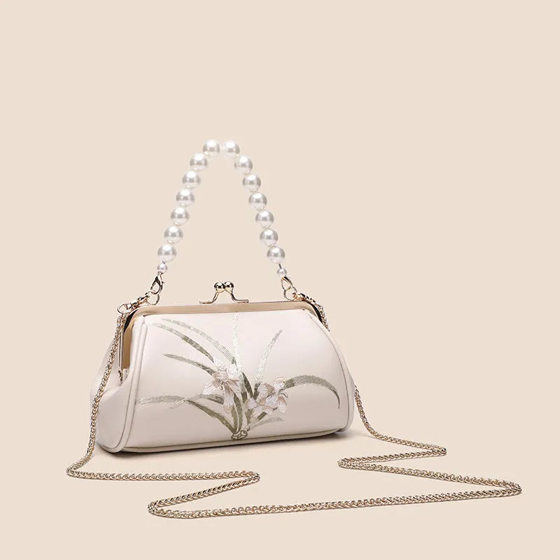 Beige soft PU leather women's shoulder bag with embroidery detail and shell shape design