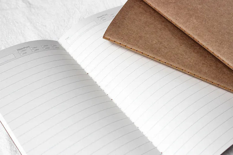 Travel cowhide diary refill inner core showing 11x21cm size and saddle stitch binding