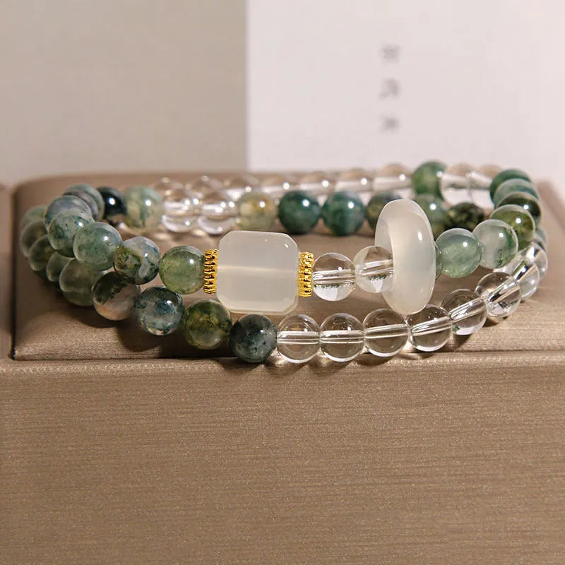 Double circle green grass agate and white agate cube sugar bracelet on a neutral background