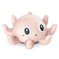 Blue or pink automatic spraying octopus bath toy with flashing lights for children's bathtub and pool play.
