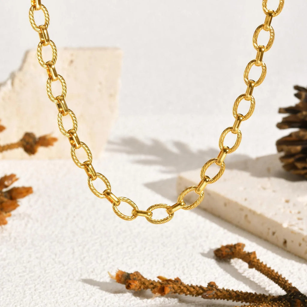 Gold electroplated stainless steel geometric embossed necklace and bracelet set for women