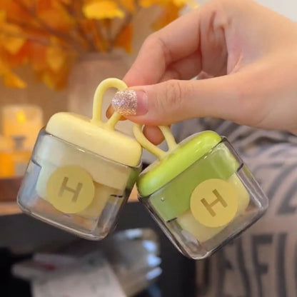 Green and yellow portable lint remover ball with ABS TPE material for gentle fabric care