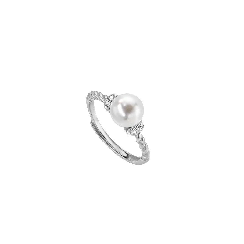 Adjustable antique twist pearl ring in copper with geometric shape and gold silver finish options.