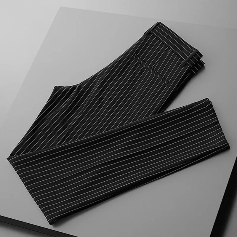 Men's thin loose casual suit pants showing draping design in black and white colour options