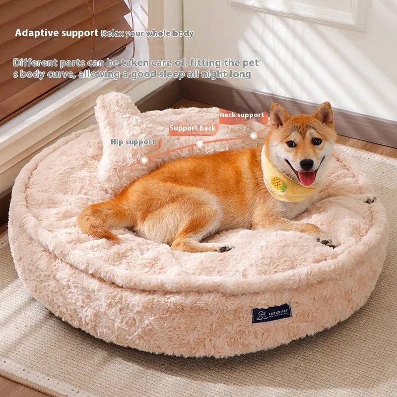 Milk tea colour round pet bed with a removable cloth cover on a wooden floor.