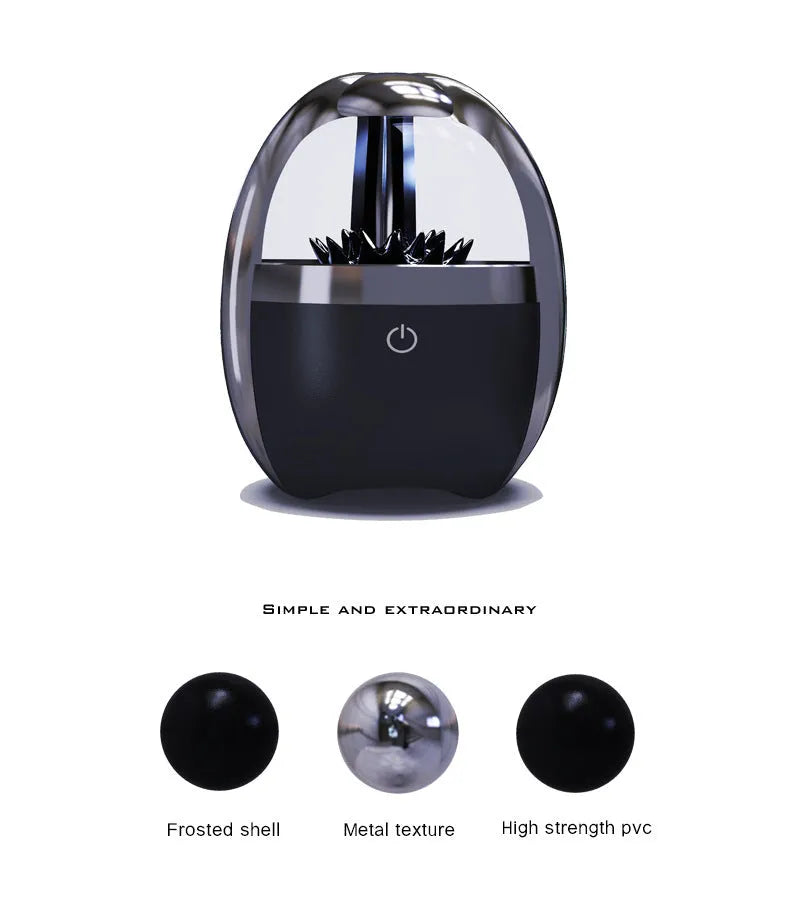 Magnetic fluid Bluetooth speaker in Silver Black with solid wood bracket on a table