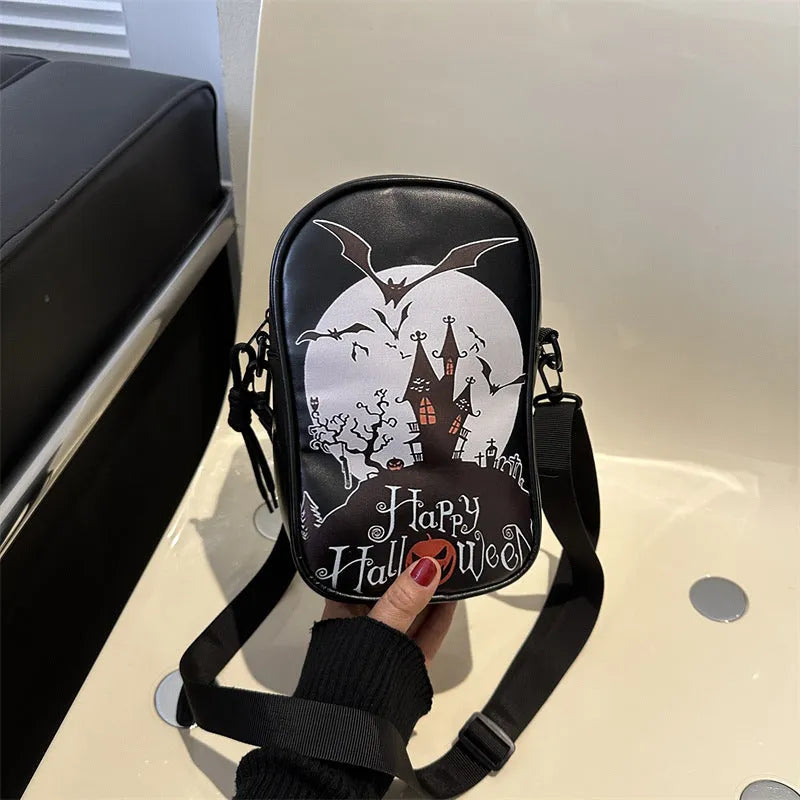 Halloween-themed crossbody phone bag with cartoon pumpkin, ghost, and bat print.