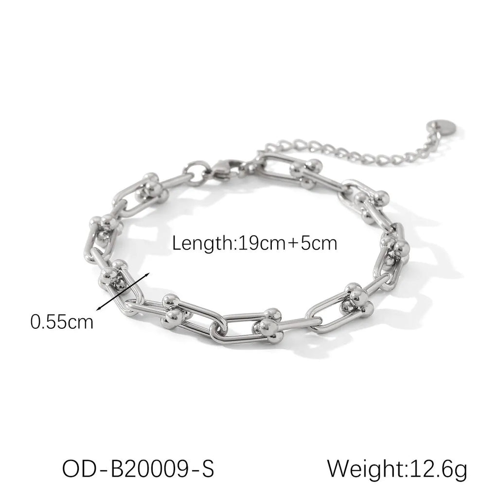 Stainless steel horseshoe chain jewellery set with titanium steel pendant showing necklace, bracelet and earring pieces