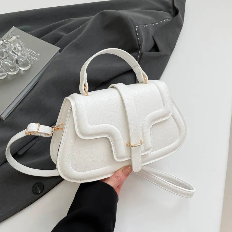 Urban Simplicity PU shoulder bag in horizontal square shape with sewing thread detail, available in black colour