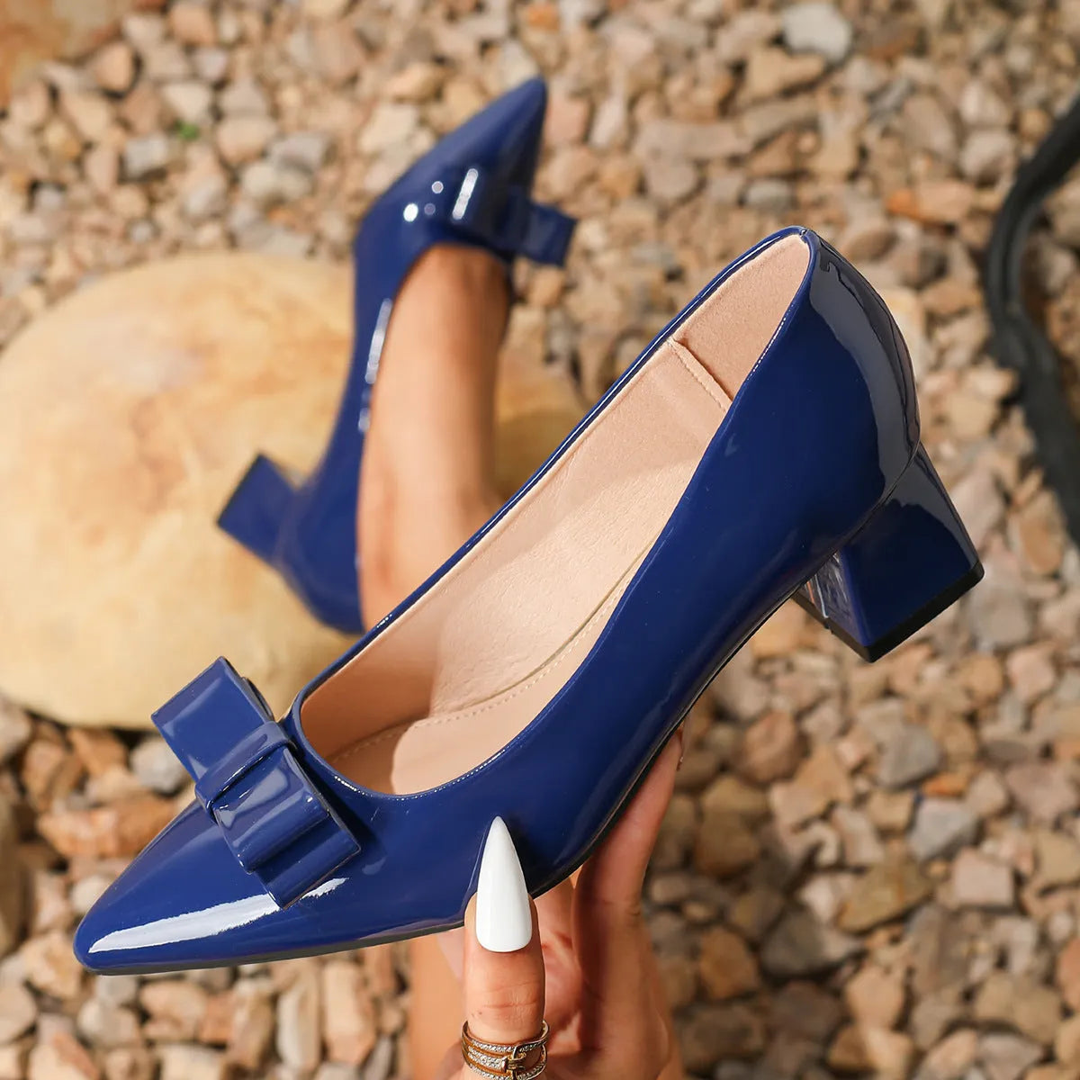 Wine red pointed-toe bowknot high heels with patent leather upper and TPU sole