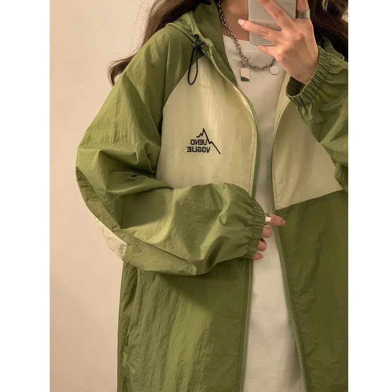 Women's summer sun protection top with raglan sleeves in apricot colour showing loose fit and splicing details