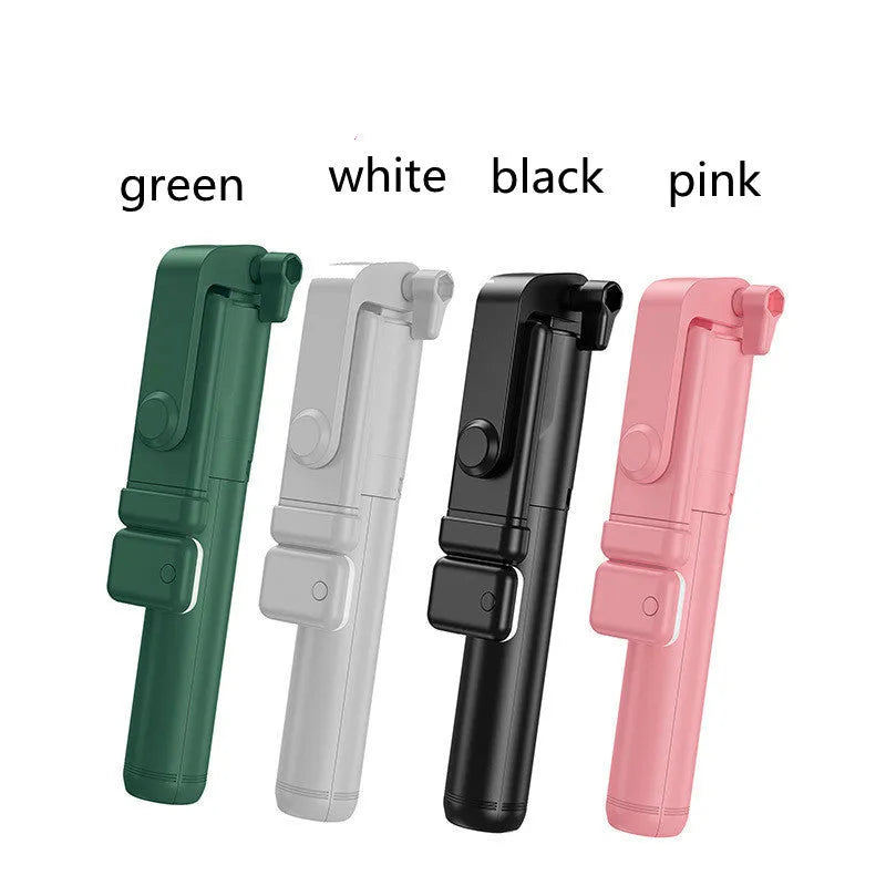 Black Bluetooth selfie stick tripod with fill light extended, holding a smartphone.