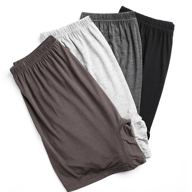Solid colour men's modal boxer shorts on a white background showing high waist design