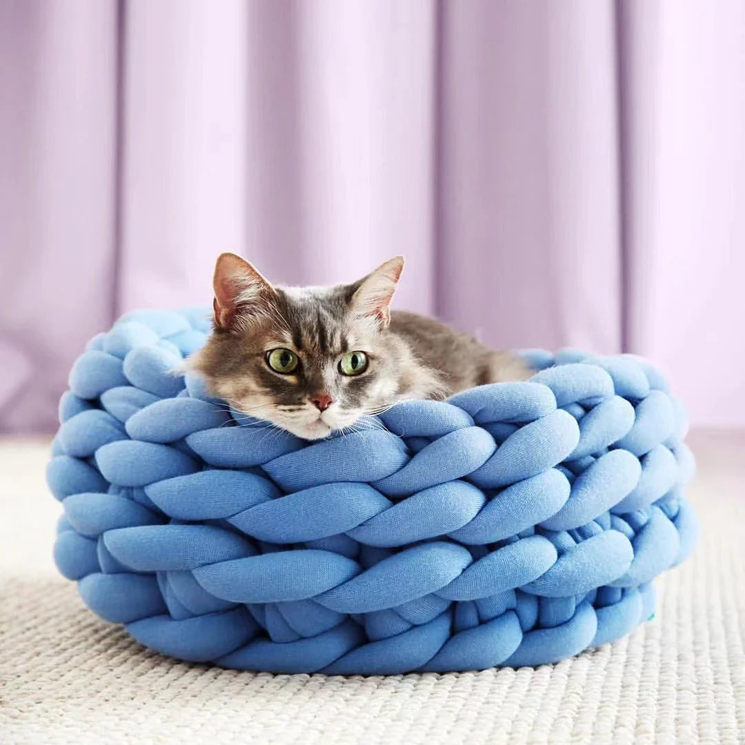 A cozy and stylish plush pet bed in various colors and sizes, providing comfort and warmth for your furry friend.