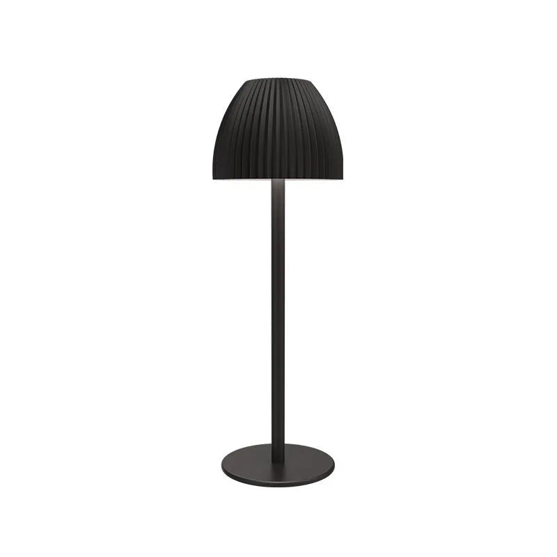 Small modern table lamp with dimming function on thin round base in black finish