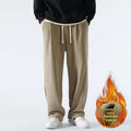 Men's double-sided polar fleece winter trousers in apricot colour showing loose Korean style and drawstring waist
