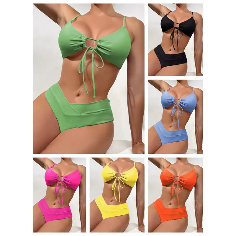 Women's orange bikini swimsuit with tied bow top and briefs bottom on a mannequin